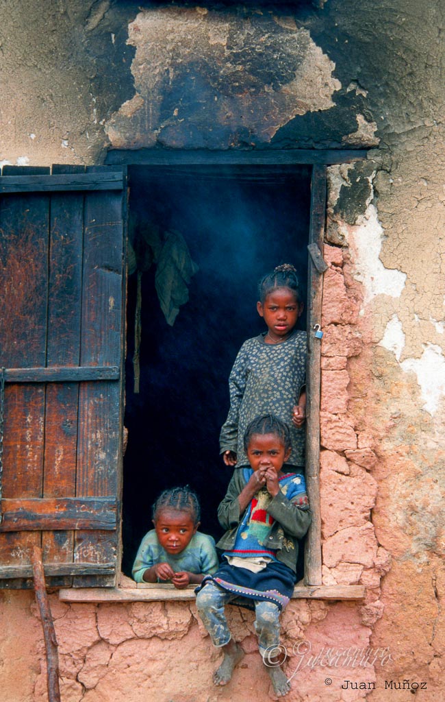 Children in the window. Madagascar.